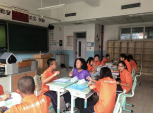 ESL teacher talking to her learners