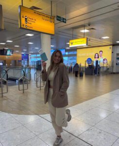 traveller at the airport before her flight 