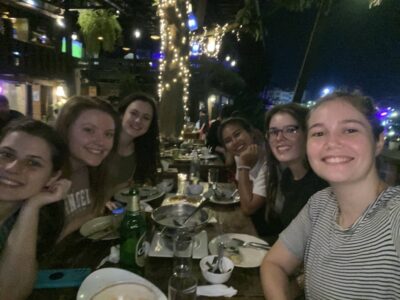 Group of friends eating in Thailand
