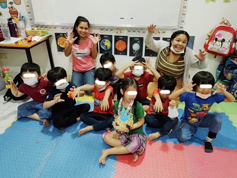 students and their teacher in cambodia