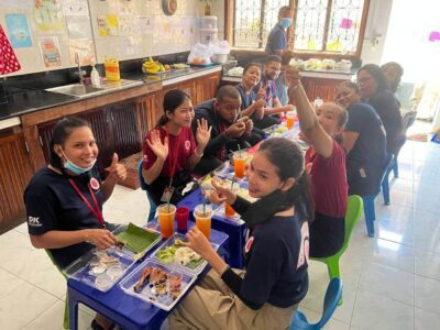 group of people eating in Cambodia