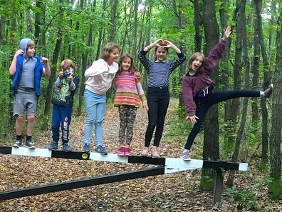 Hungarian kids smiling in the forest