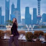 Woman enjoying the Bund in Shanghai